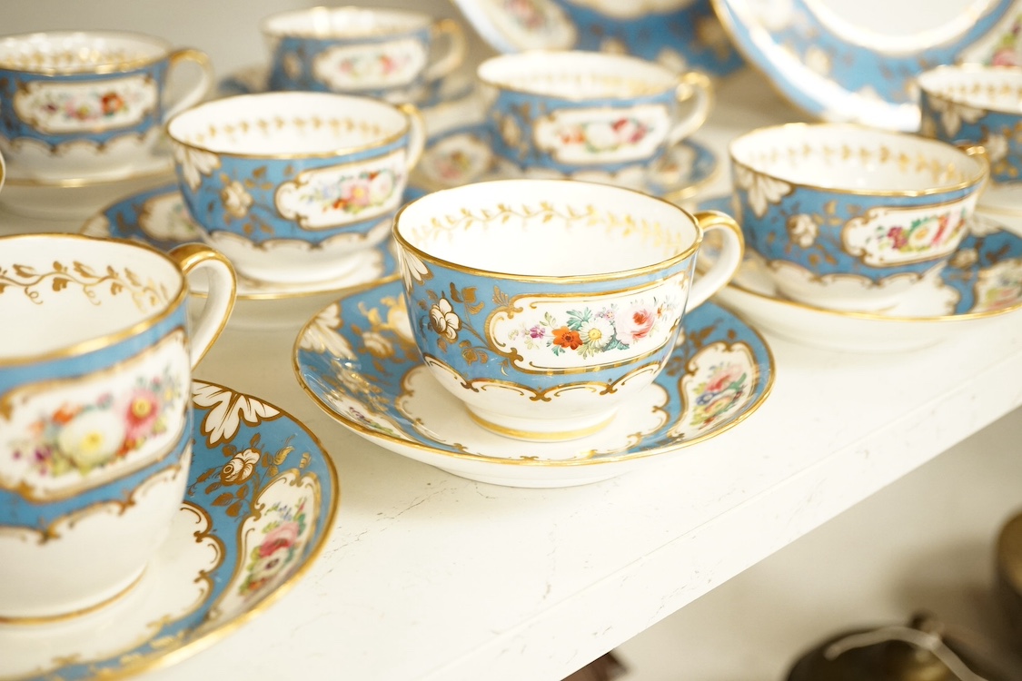A mid 19th century English porcelain tea service with floral and gilt decoration. Condition - mostly good